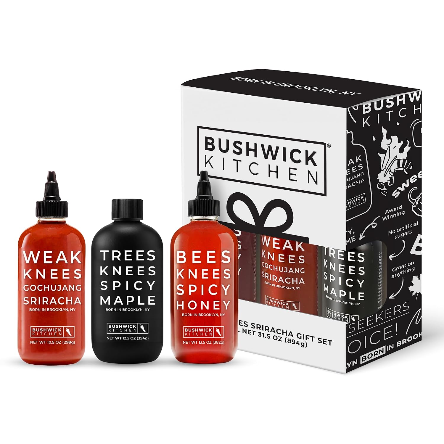 Three-bottle gift set of Bushwick Kitchen spicy honey, gochujang sriracha and spicy maple syrup with its printed gift box