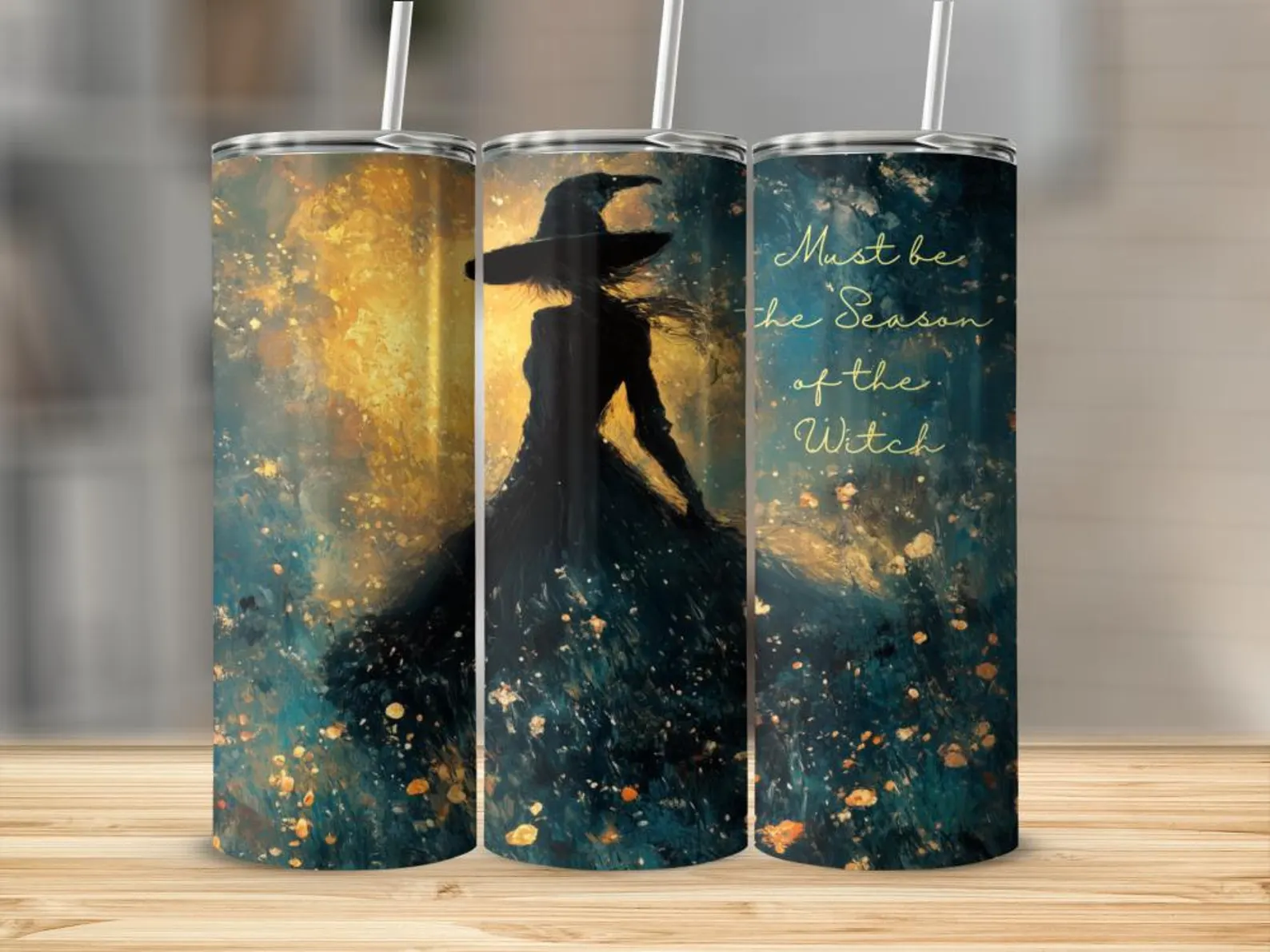 Three views of a 20 ounce insulated tumbler showing a witch in silhouette against a golden painterly sky with the words Must be the Season of the Witch